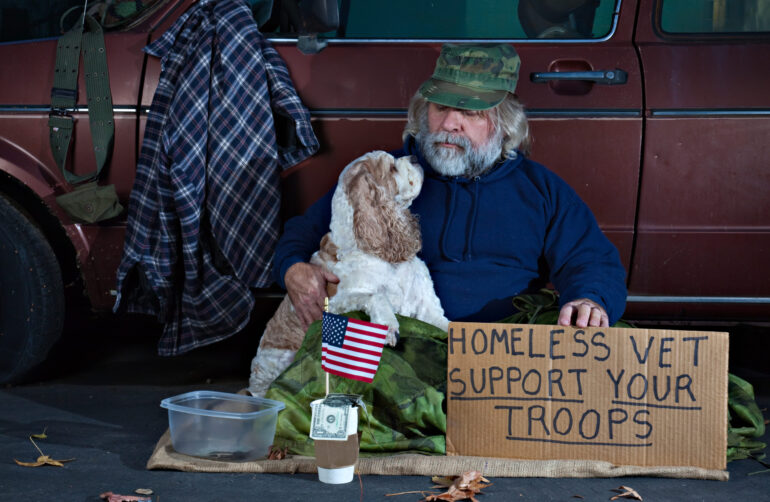 Veteran Looking at His Dog